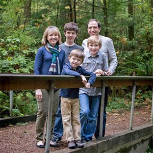 Beth Sigall with her family. Clockwise from top left: Beth, Anthony, Jule, Thomas, and Joseph.